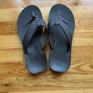 Plain dark brown flip flops